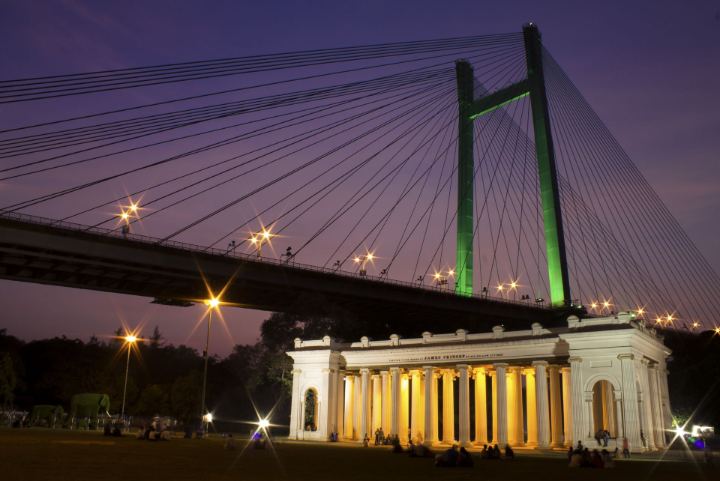 Palladian porch at Prinsep Ghat along the Hooghly River in Kolkata at sunset.