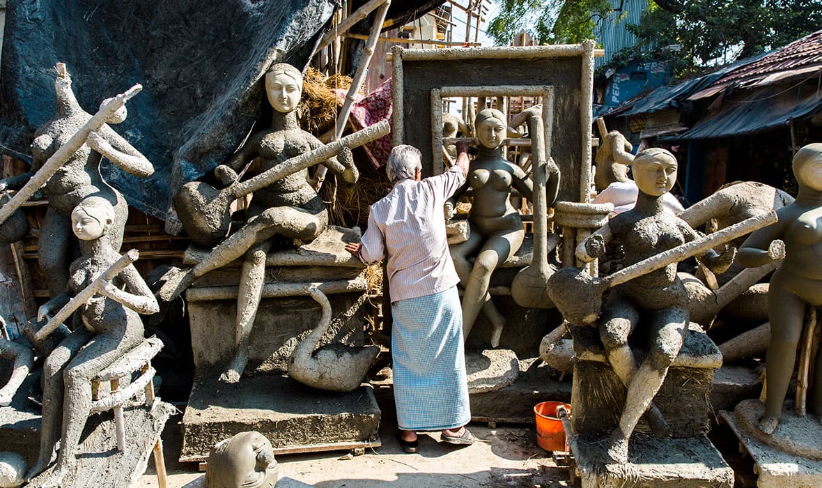 Colorful clay idols in the artisan workshops of Kumartuli, Kolkata.