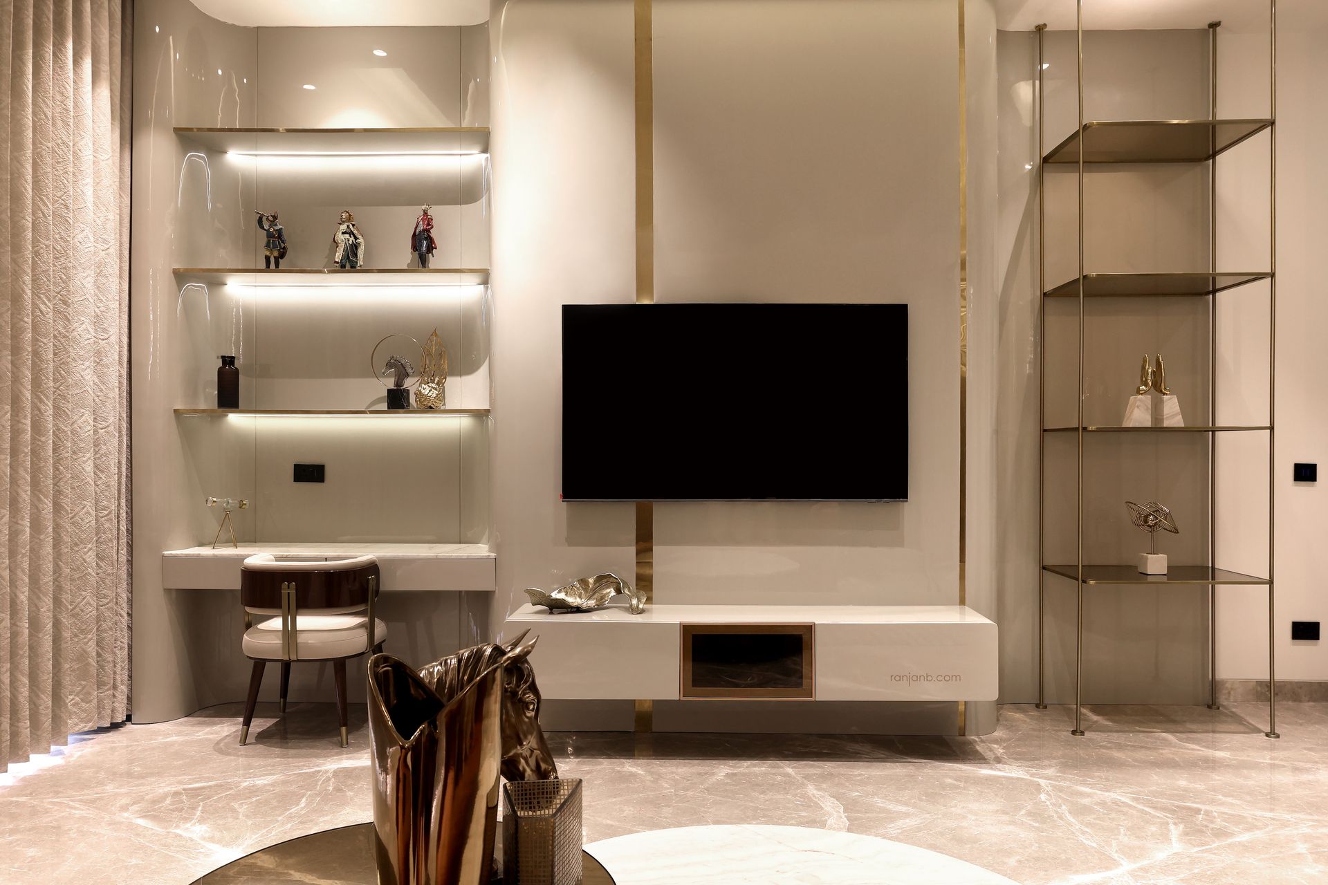 Modern TV unit with integrated study nook in a luxury apartment at Urbana complex, photographed by Ranjan Bhattacharya.