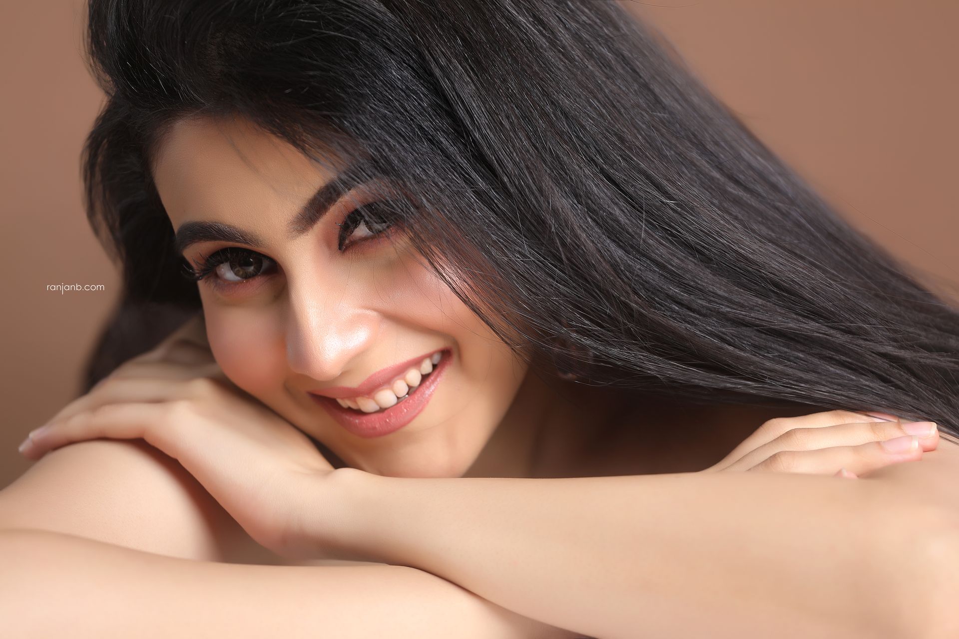 Nayonika Gangoly posing confidently after finding her rhythm during the shoot, her expressions glowing with newfound ease and understanding.