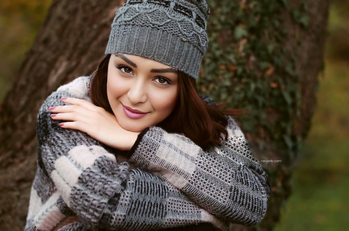 Portrait of Praniya Paul in a winter outfit, photographed by Ranjan Bhattacharya, with makeup by Nanda Majumdar.