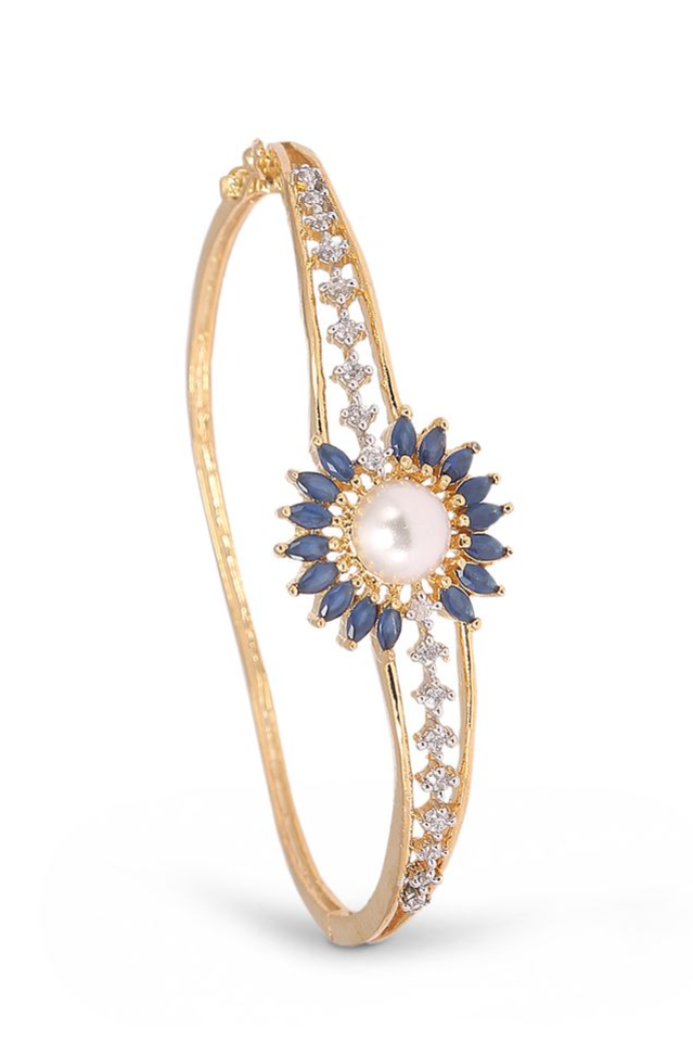 A beautifully crafted diamond studded bangles photographed against a white background by product photographer Ranjan Bhattacharya in Kolkata.