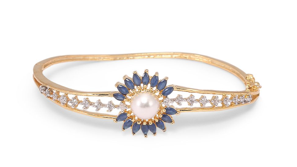 A beautifully crafted diamond studded bangles photographed against a white background by product photographer Ranjan Bhattacharya in Kolkata.