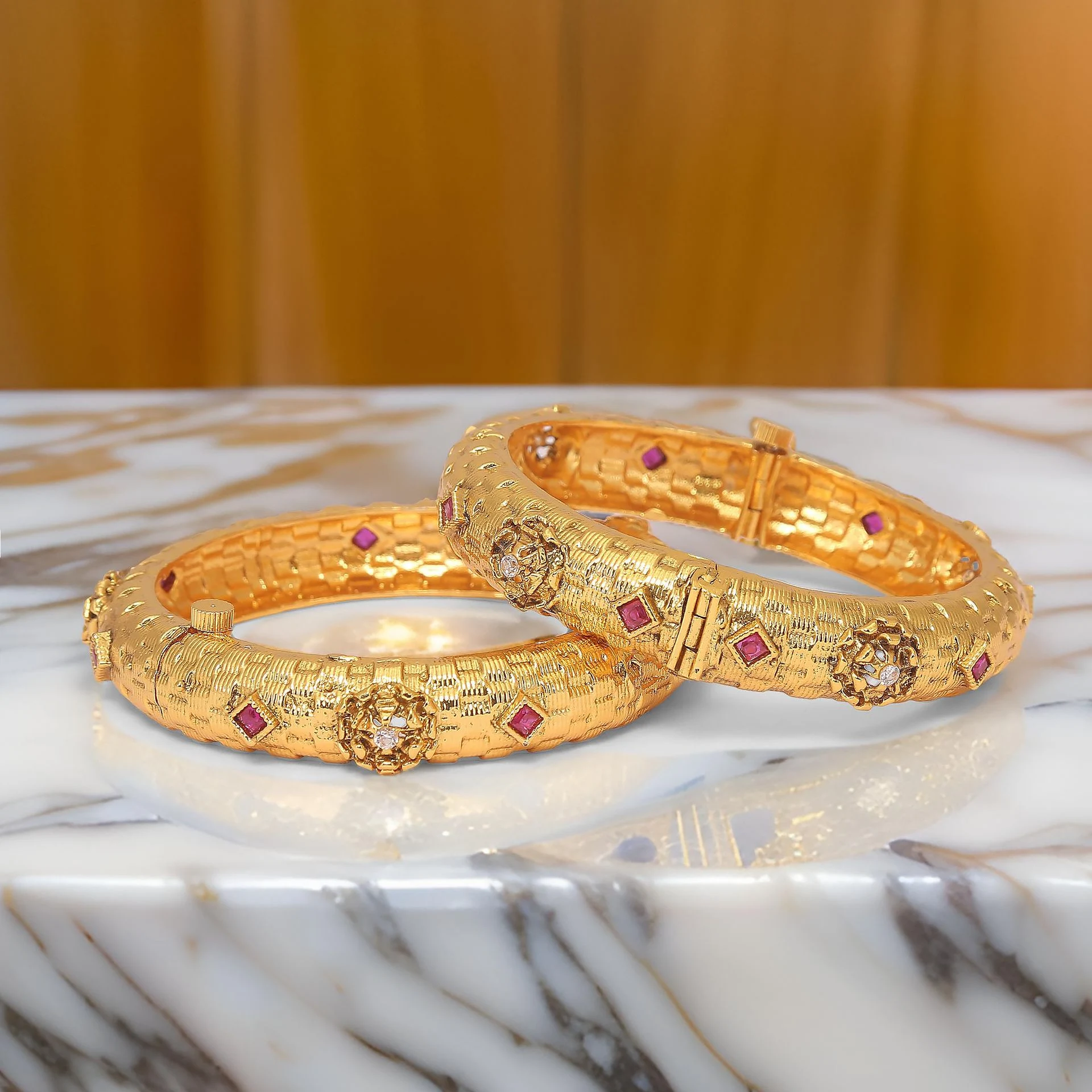 A beautifully crafted gold bangles photographed by the best jewelry photographer Ranjan Bhattacharya in Kolkata.