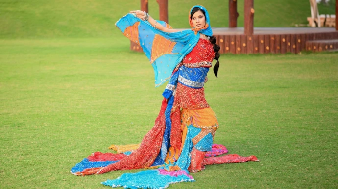 Outdoor saree advertising campaign shoot in Jaipur featuring traditional Indian fashion styling and large-scale commercial production setup.