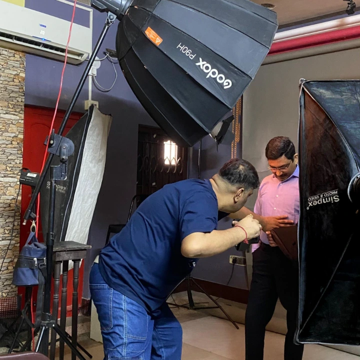 Structured executive portrait lighting setup during enterprise corporate session