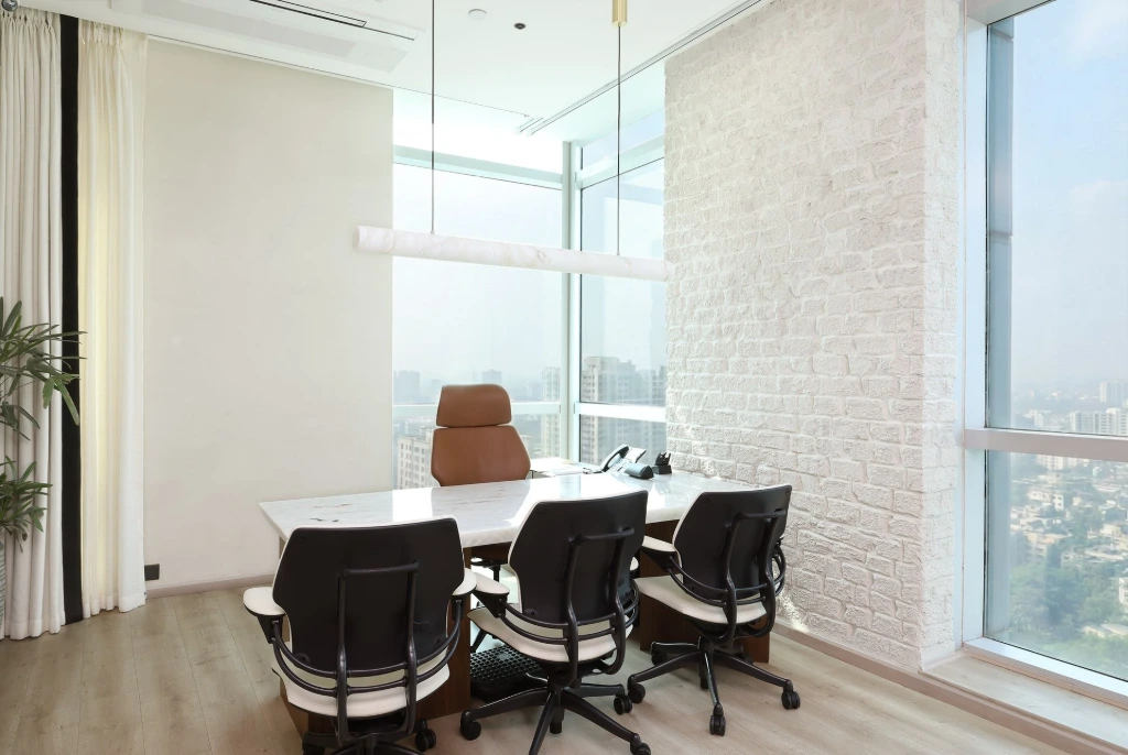 Modern corporate meeting space photographed with natural daylight Corporate interior photography showing modern meeting and conference workspace