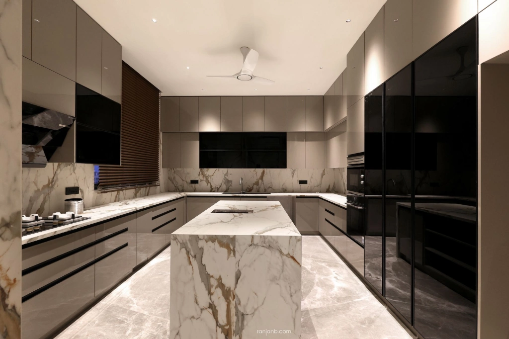 Urbana Residence, Kolkata — Marble kitchen, Canon R5 + RF 15-35mm Luxury modular kitchen with marble island at Urbana Kolkata — high-contrast interior photography by Ranjan Bhattacharya