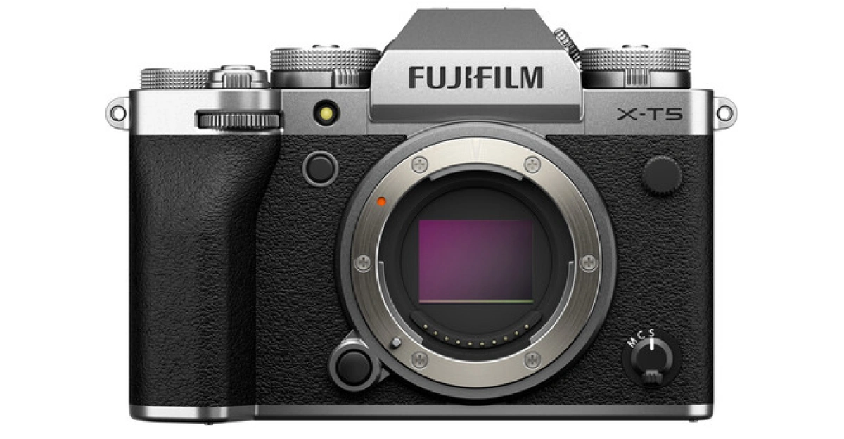 Fujifilm X-T5 mirrorless camera body front view with retro design and APS-C sensor on white background