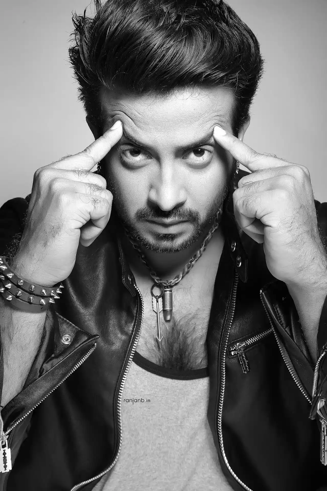 Black and white photography of Superstar Shakib Khan during the shooting in India for the Bengali feature film "Agni" by Ranjan Bhattacharya Photography.