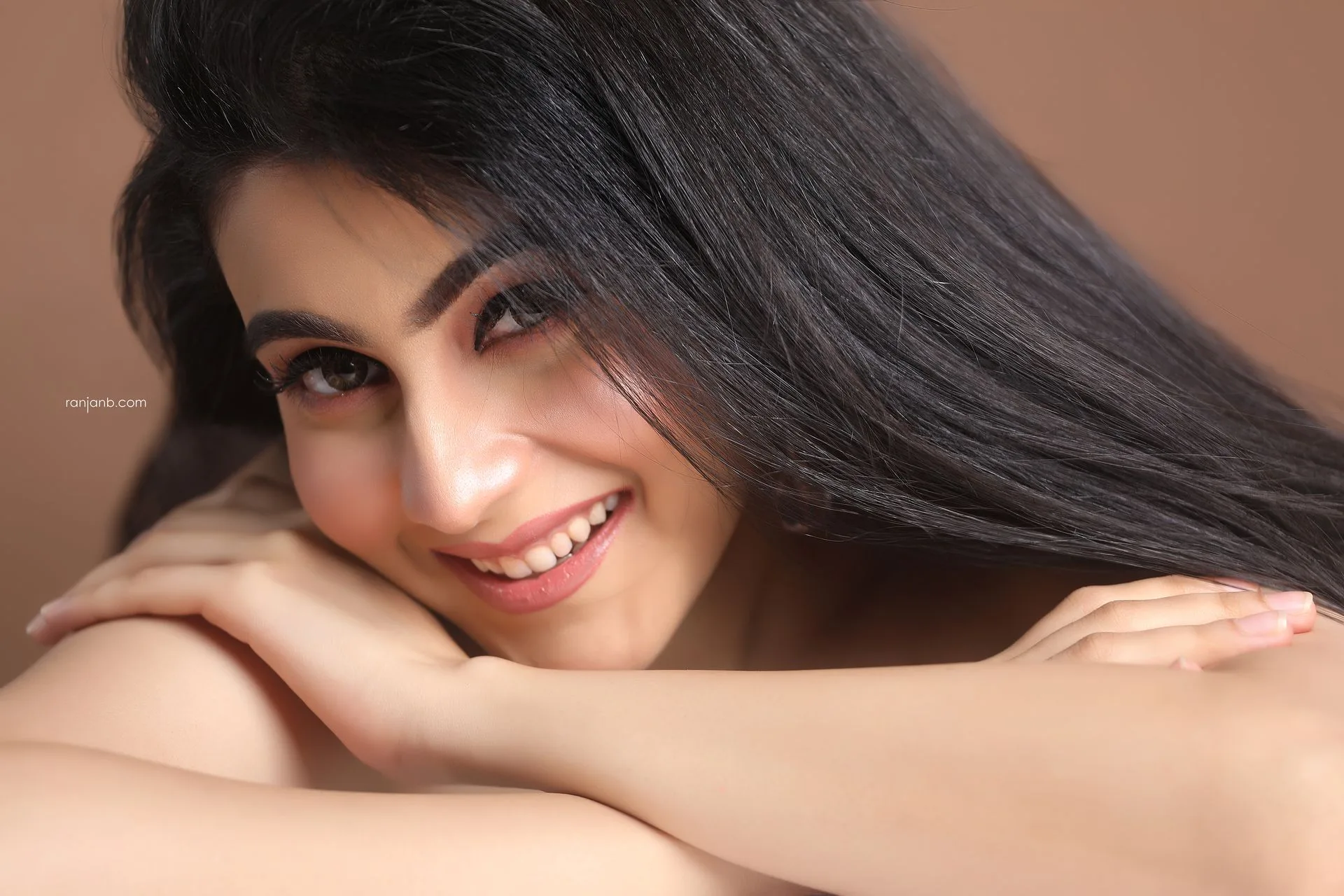 Nayonika Gangoly posing confidently after finding her rhythm during the shoot, her expressions glowing with newfound ease and understanding.