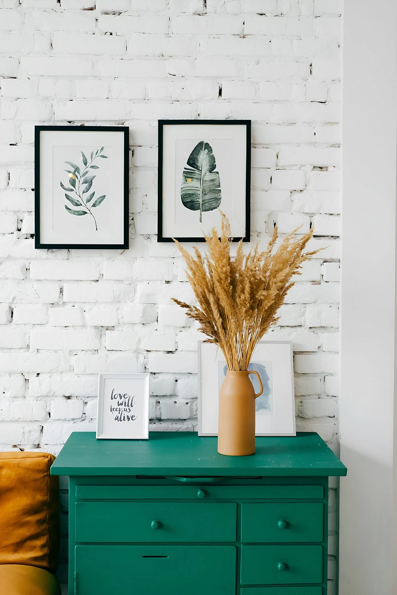 A teal wooden drawer dresser in a well decorated demo flat at Garden Vista, photography by Ranjan Bhattacharya