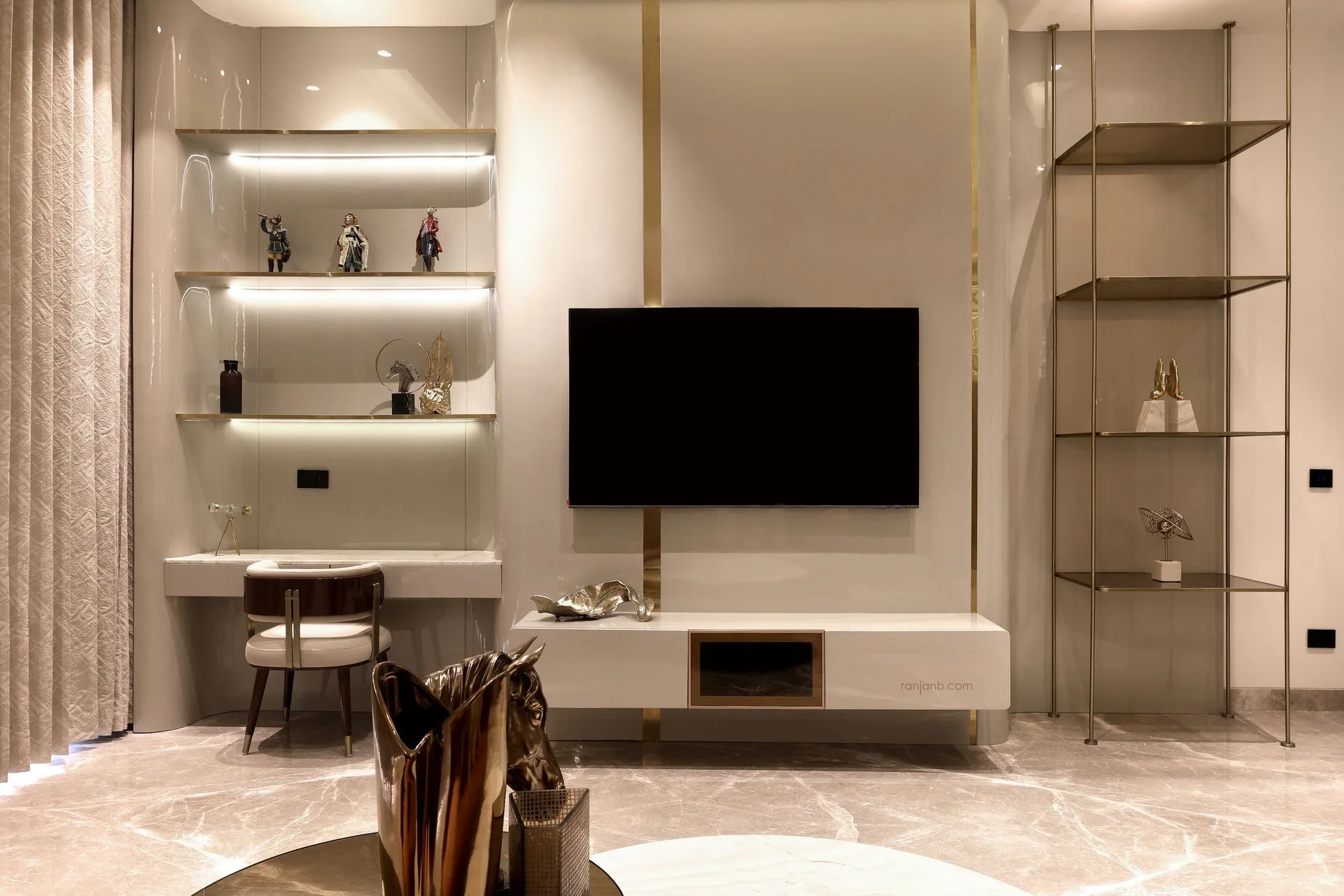Modern TV unit with integrated study nook in a luxury apartment at Urbana complex, photographed by Ranjan Bhattacharya.