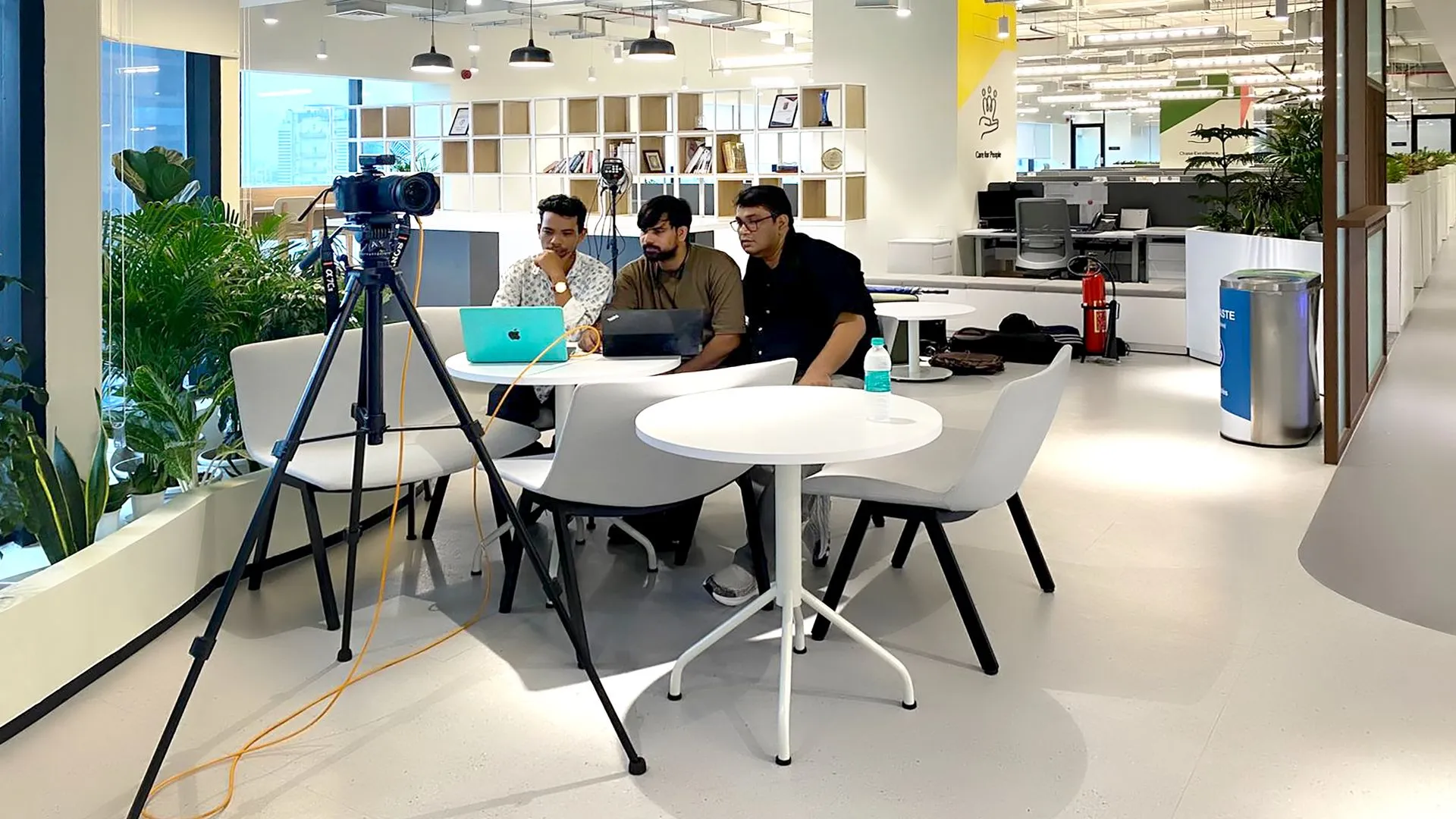 Behind the Scenes: Reviewing compositions with the HDG team during the commercial interior photography assignment. Behind-the-scenes discussion during a commercial interior photography assignment with the HDG team, reviewing compositions and planning architectural photographs on site.