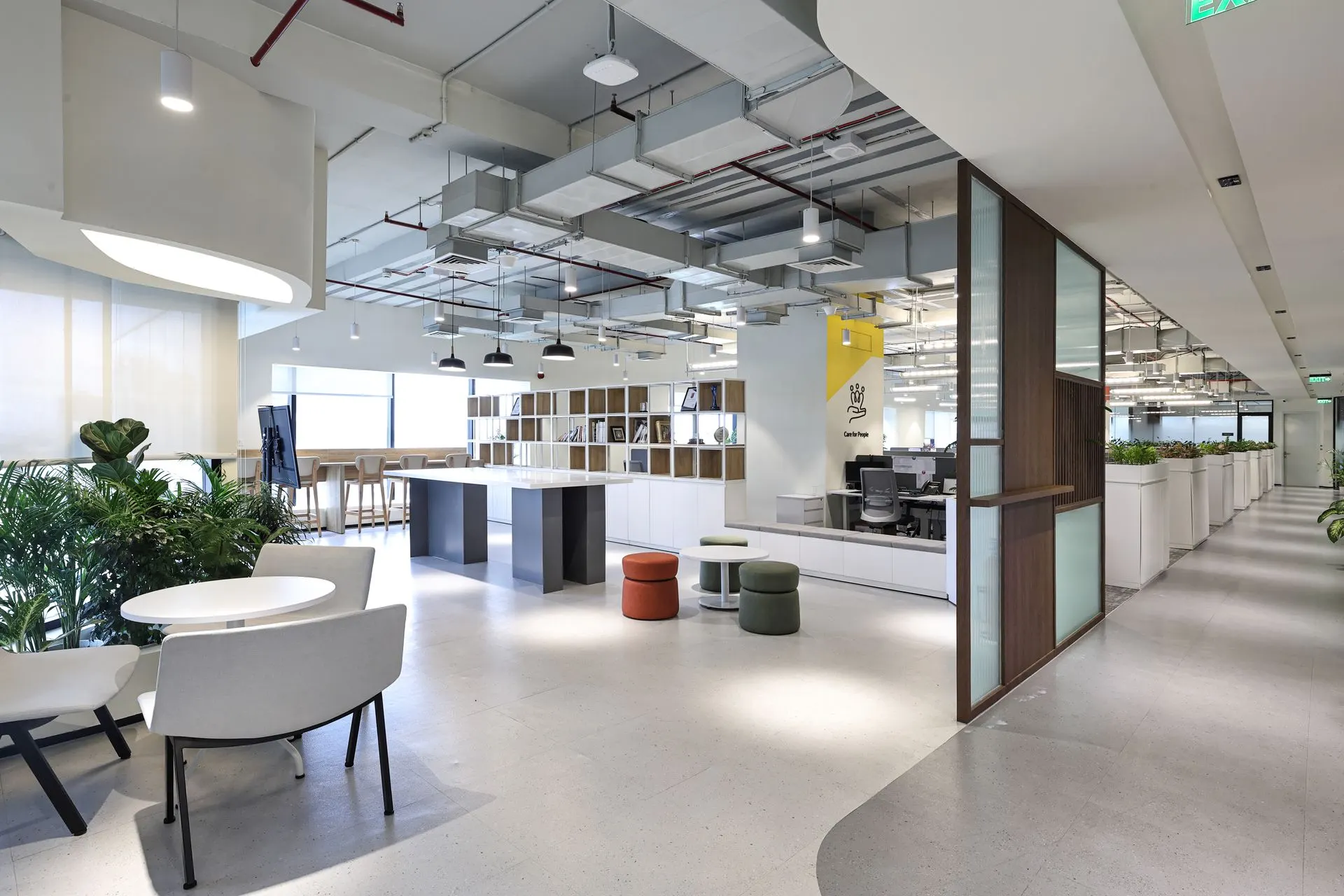 Commercial office workspace interior photography featuring a modern open-plan corporate office with collaborative seating, contemporary architecture and premium workplace design.