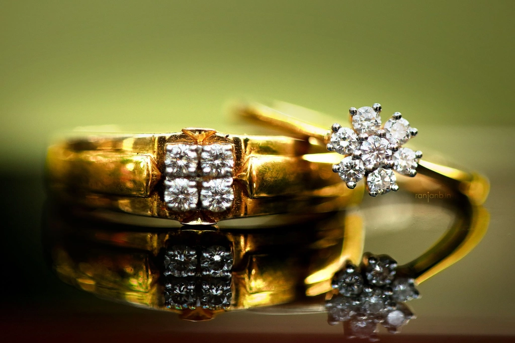 Macro shot of two wedding rings, showcasing intricate details, captured by Ranjan Bhattacharya.