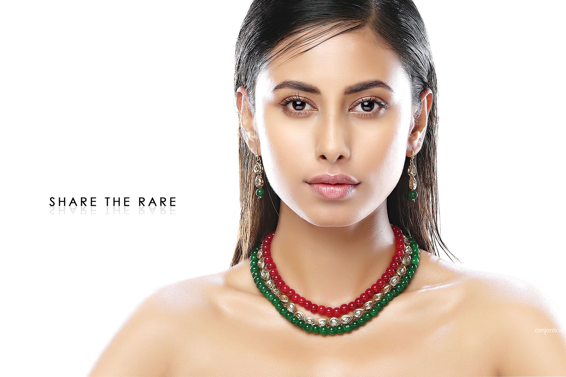Ankita Saha posing with traditional jewelry during a professional photoshoot by Ranjan Bhattacharya.