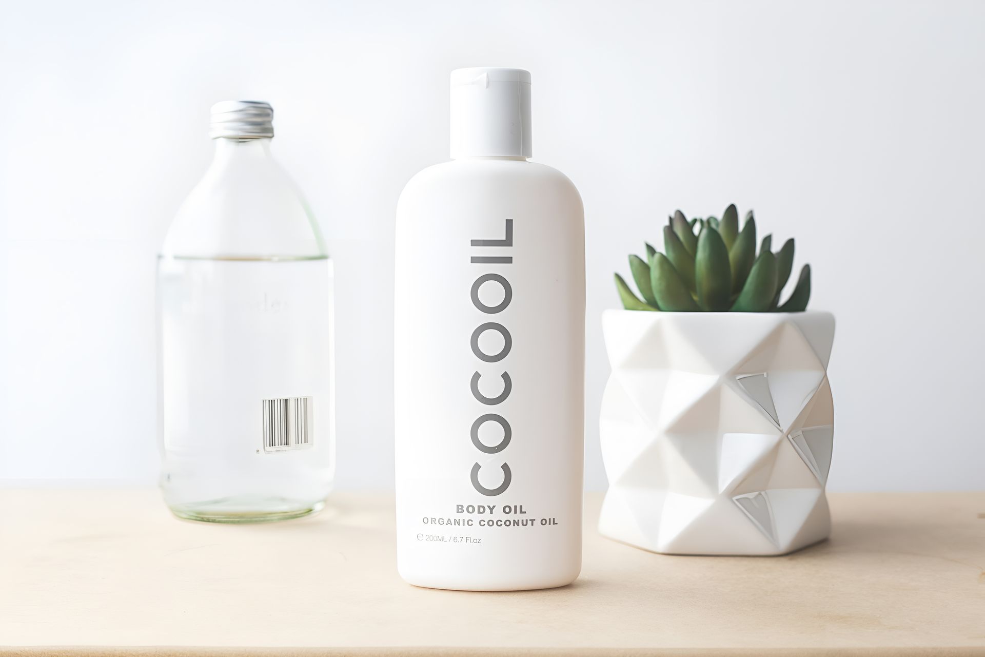 Cocooil baby oil on a table, expertly photographed by Ranjan Bhattacharya