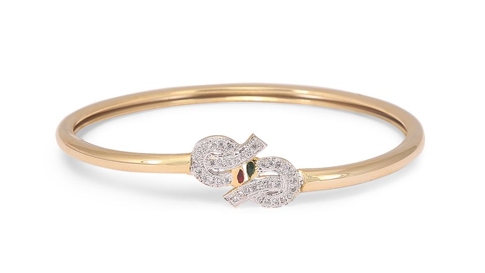 A beautifully crafted diamond studded bangles photographed against a white background by product photographer Ranjan Bhattacharya in Kolkata.